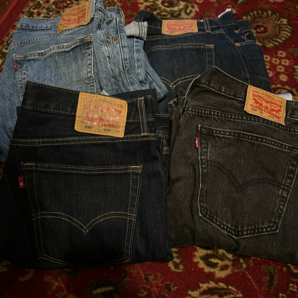 4 pairs Levi's Relaxed Fit Jeans - Light Blue, Dark Blue, and Washed black